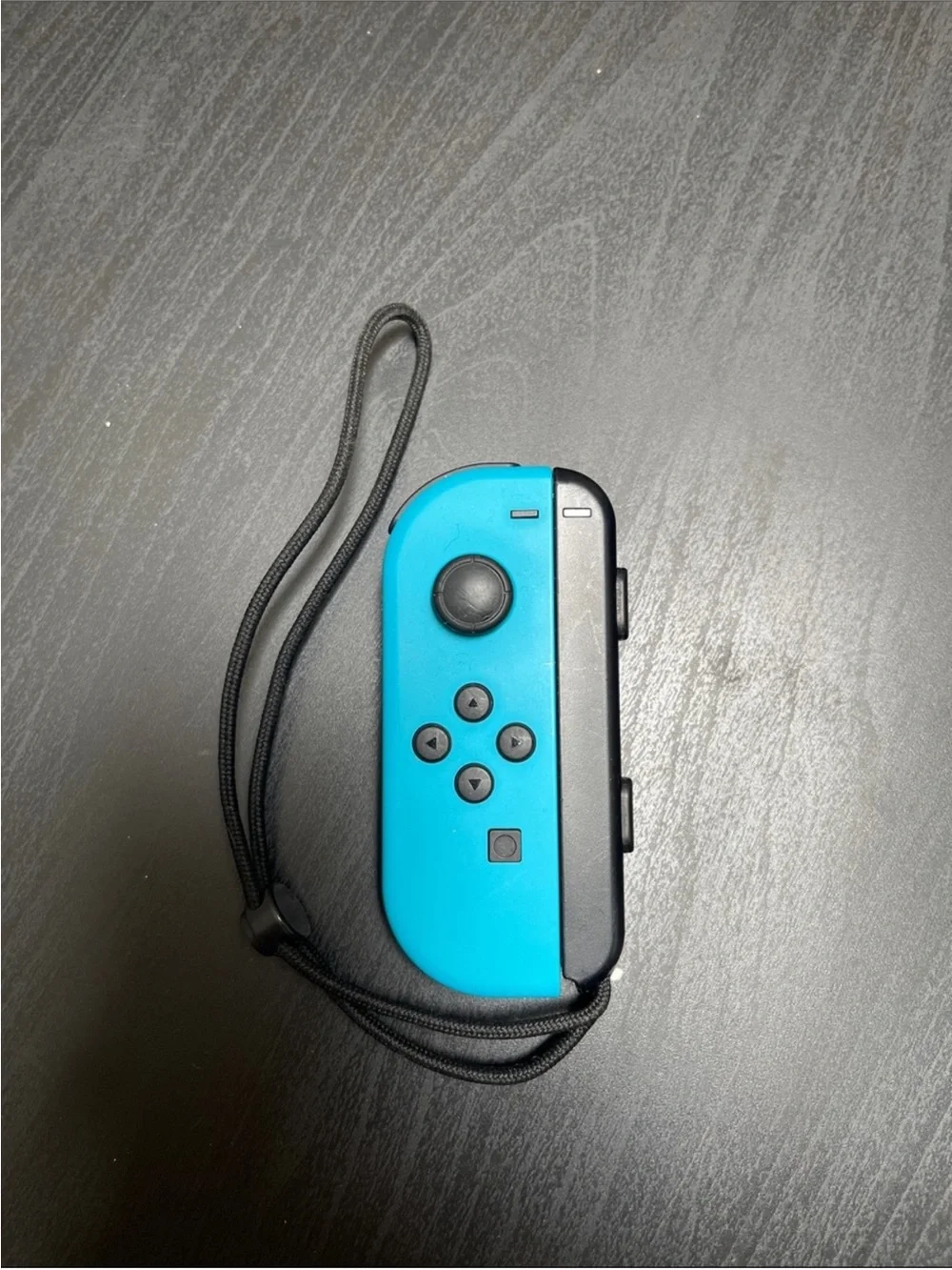 Nintendo LEFT Joy-Con Controller — Neon Blue with Black Rail and Strap